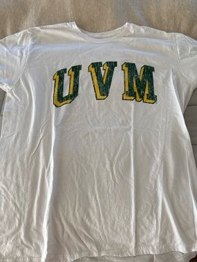 White UVM Graphic T-Shirt with Green and Yellow Lettering